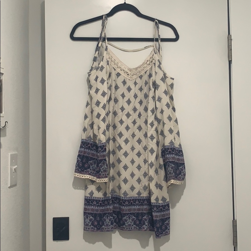 White no shoulder flow dress